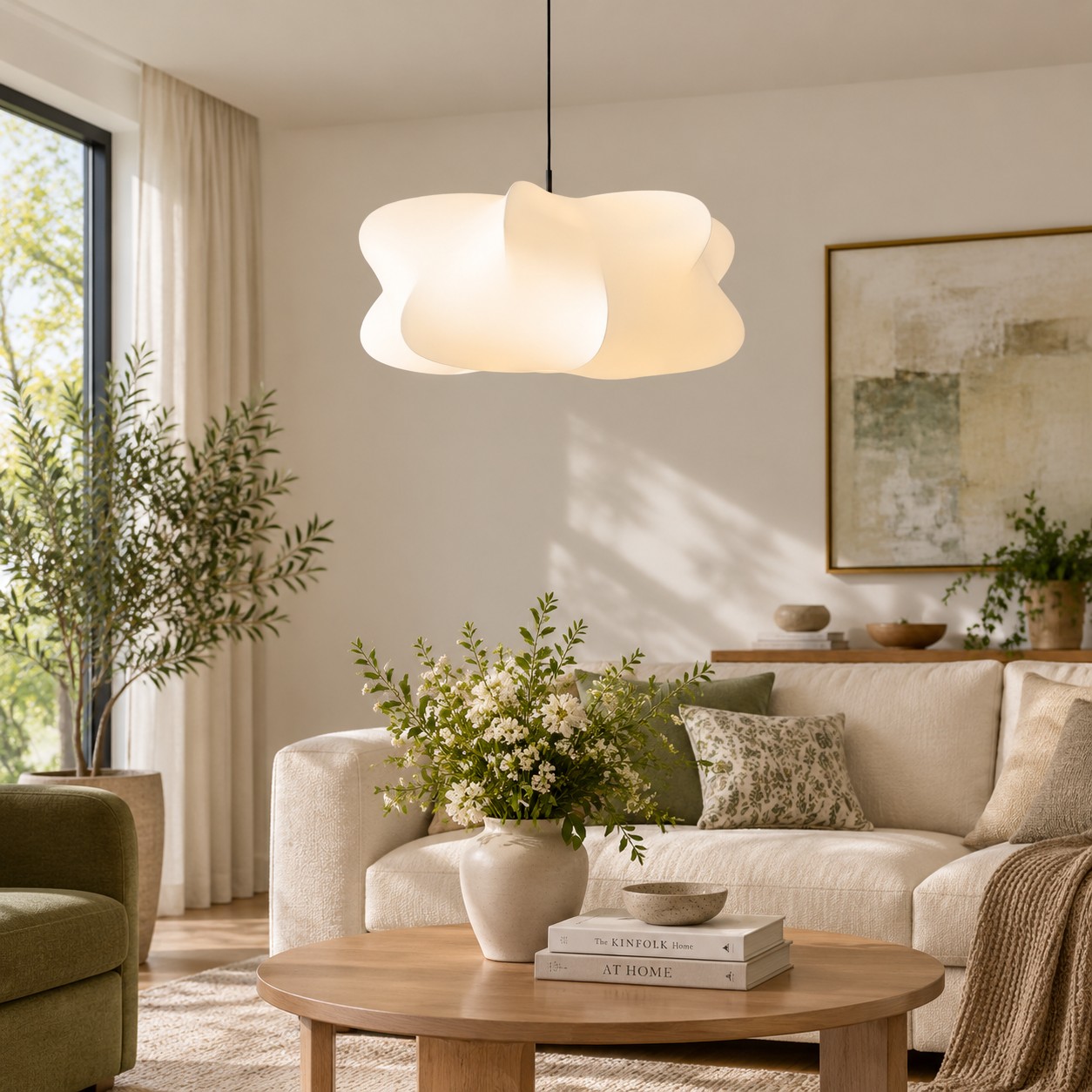 Sculptural pendant light styled in a living room