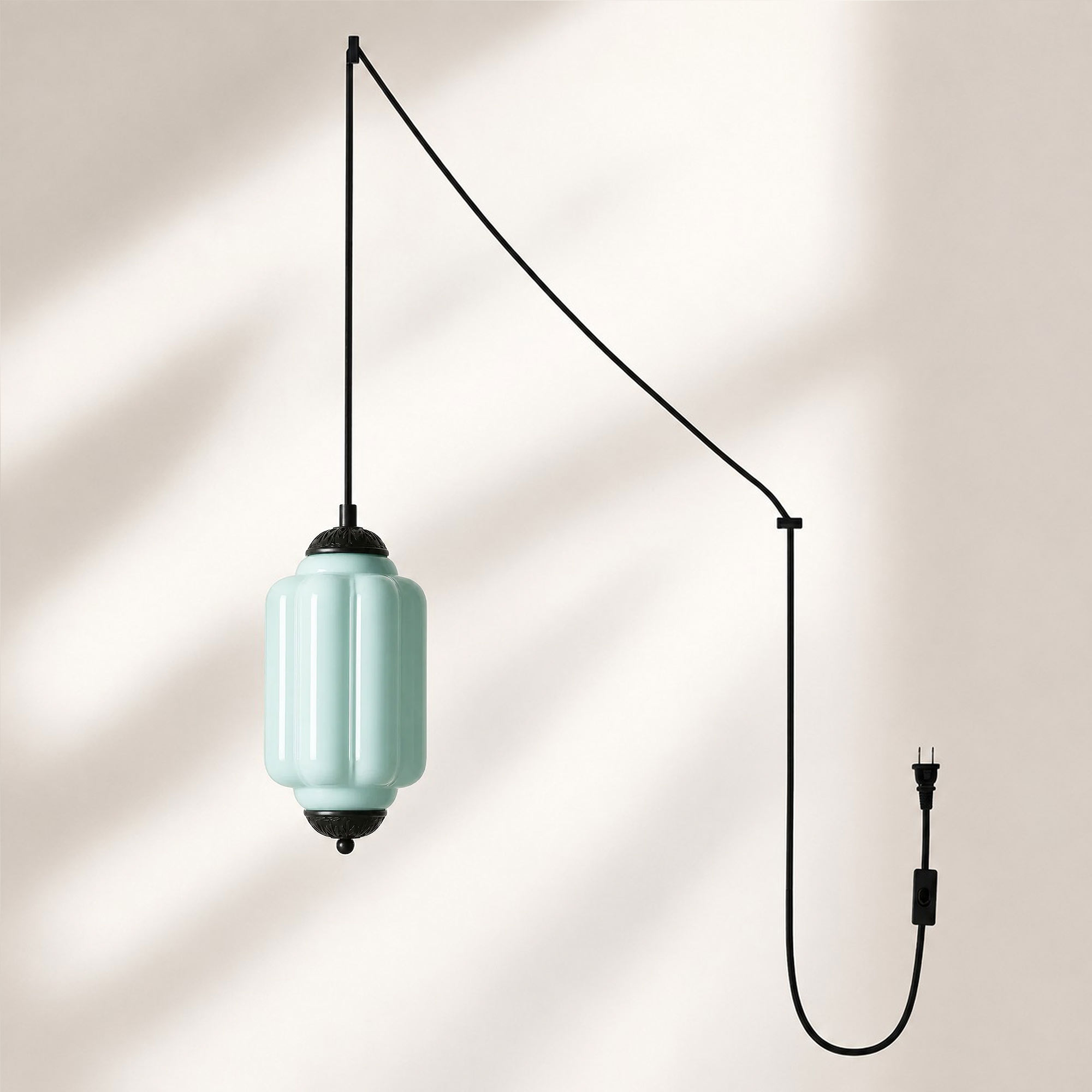 Black finish pendant with blue glass shade