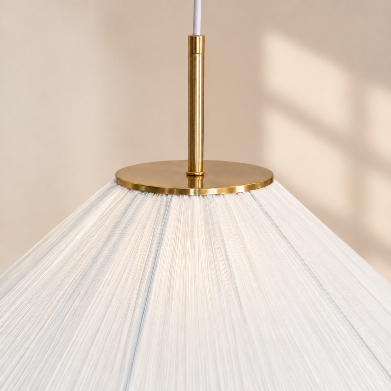 Close-up of gold hardware and fabric shade