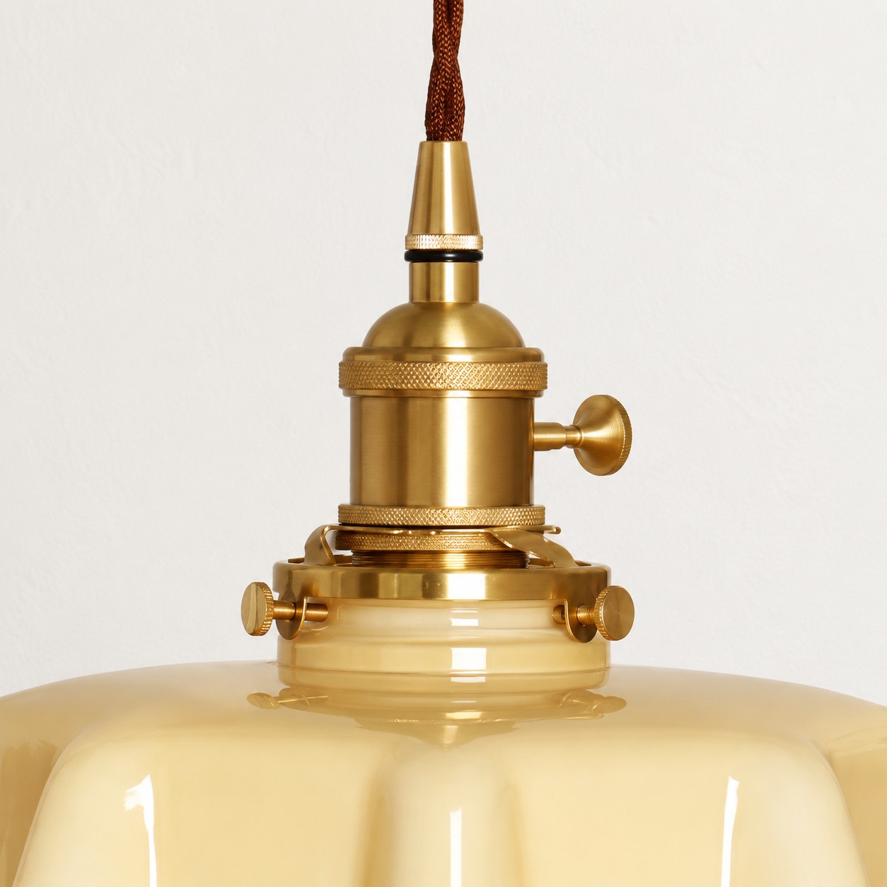 Close-up of the antique brass pendant fitting